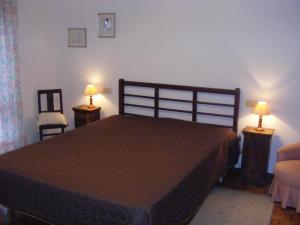 Postel nebo postele na pokoji v ubytování Lavra Beach House