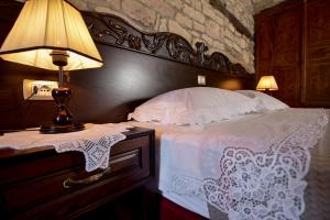 Postel nebo postele na pokoji v ubytování Hotel Kalemi 2