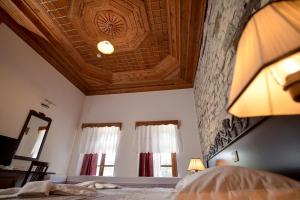 Postel nebo postele na pokoji v ubytování Hotel Kalemi 2