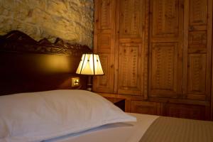 Postel nebo postele na pokoji v ubytování Hotel Kalemi 2