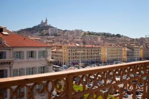a view of a city from a balcony at Escale Oceania Marseille Vieux Port in Marseille