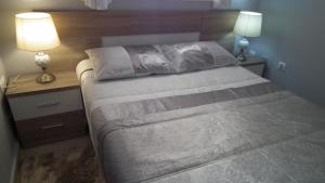 Ένα ή περισσότερα κρεβάτια σε δωμάτιο στο Sea view Apartament