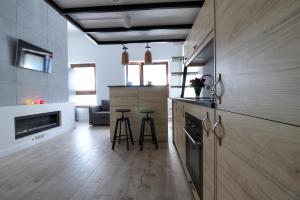 Kuchyňa alebo kuchynka v ubytovaní Celma Condohotel Old Town Gdańsk