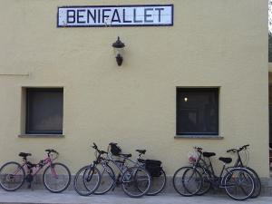 bicycles are parked in front of a building at Antiga Estació de Benifallet in Benifallet