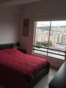 Postel nebo postele na pokoji v ubytování Suites Parque Real