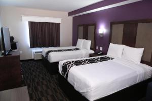 Postel nebo postele na pokoji v ubytování Home Inn and Suites Memphis