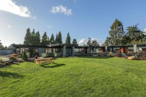 a house with a large lawn in front of it at Heliotrope Hotel in Bellingham