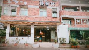 Facade o entrance ng Guiju Lin Garden Homestay