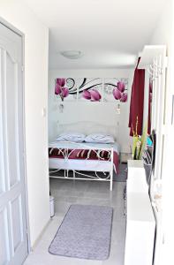 Postel nebo postele na pokoji v ubytování Apartments Kozjan