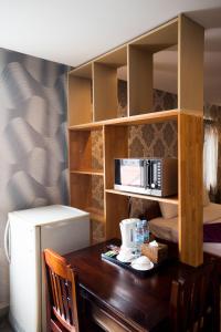 Příslušenství pro přípravu čaje a kávy v ubytování White Residence Hotel & Apartment