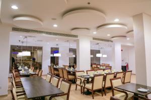 Restaurace v ubytování Muscat Inn Hotel