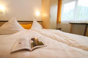 Posteľ alebo postele v izbe v ubytovaní ARBOR Hotel & Apartments