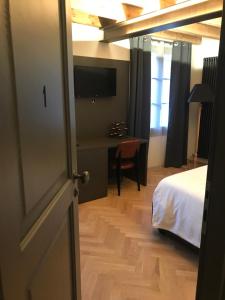 A bed or beds in a room at Hotel Dal Menga