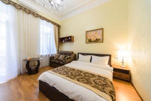 Postel nebo postele na pokoji v ubytování Kiev Centre Apartments