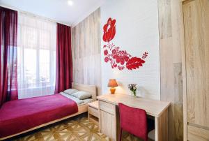 Postel nebo postele na pokoji v ubytování Cossacks Hostel