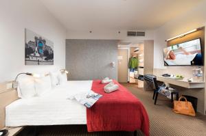 Ένα ή περισσότερα κρεβάτια σε δωμάτιο στο Bo18 Hotel Superior