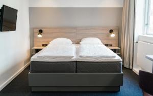 Letto o letti in una camera di Copenhagen Go Hotel