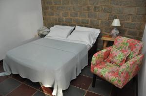 Postel nebo postele na pokoji v ubytování Quilombo Hotel Fazenda