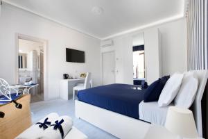 Säng eller sängar i ett rum på Villa Iolanda