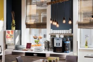 Η κουζίνα ή μικρή κουζίνα στο Bo18 Hotel Superior