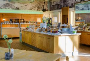 a kitchen filled with lots of counter space at ibis Styles Leipzig in Radefeld