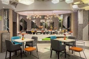 ibis Styles Medan Pattimura餐厅或其他用餐的地方