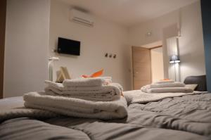 Postel nebo postele na pokoji v ubytování La Fara B&B