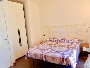 Ένα ή περισσότερα κρεβάτια σε δωμάτιο στο Villa Mare