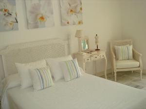 Postel nebo postele na pokoji v ubytování Villa lujo tranquila con piscina a 5 min playa + 37 fotografií
