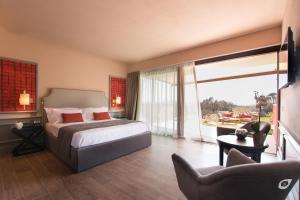 Letto o letti in una camera di Buonamico Wine Resort