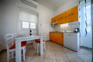 Kuchyň nebo kuchyňský kout v ubytování Apartment Jure + 8 fotografií