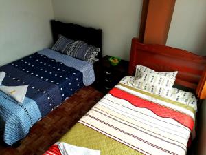 Letto o letti in una camera di Hospedaje Central Piura