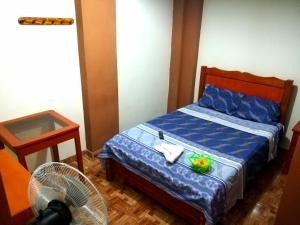 Letto o letti in una camera di Hospedaje Central Piura