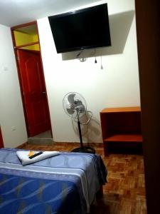TV a/nebo společenská místnost v ubytování Hospedaje Central Piura + 36 fotografií