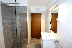 Et badeværelse på Apartment Draga 17