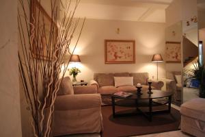 Posezení v ubytování Achillion Hotel