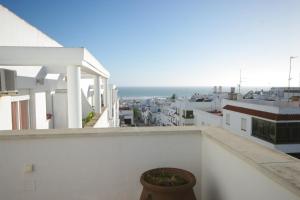 a view of the ocean from the balcony of a house at Atico centro Conil in Conil de la Frontera