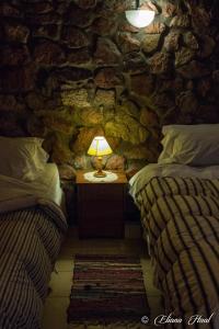 Tempat tidur dalam kamar di La Calandria Casa de Campo