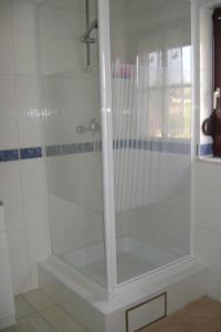 Ein Badezimmer in der Unterkunft Le Castillon