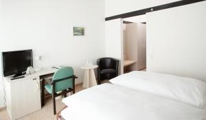TV a/nebo společenská místnost v ubytování Hotel Abendroth