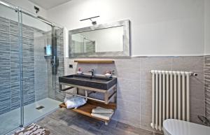 a bathroom with a sink and a shower at B&BLaTosca in Marina di Massa +29 photos