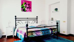 Posteľ alebo postele v izbe v ubytovaní Lido di Ostia 1933