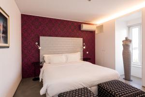Postel nebo postele na pokoji v ubytování Apartments Pateo - Lisbon Lounge Suites