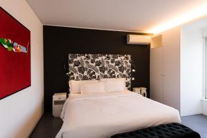 Postel nebo postele na pokoji v ubytování Apartments Pateo - Lisbon Lounge Suites
