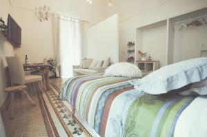 Postel nebo postele na pokoji v ubytování B&B Le Ferule + 37 fotografií