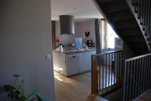 a kitchen with a sink and a counter top at Maison d' hôtes individuelle La Relinquière in Milhac