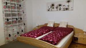 Katil atau katil-katil dalam bilik di Gasthaus Vinaders