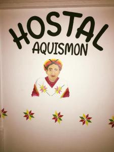 a sign for a museum with a picture of a man at Hostal Aquismon in Aquismón