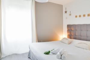 Un ou plusieurs lits dans un hébergement de l'établissement Osemae Immobilier - Redon Port-Chatelêt