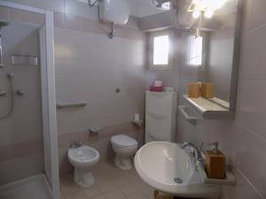 Koupelna v ubytování Casa Giglio + 21 fotografií